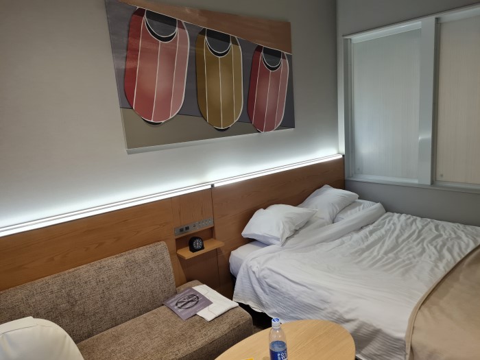 Photo of the double bed at Remm Tokyo Kyobashi